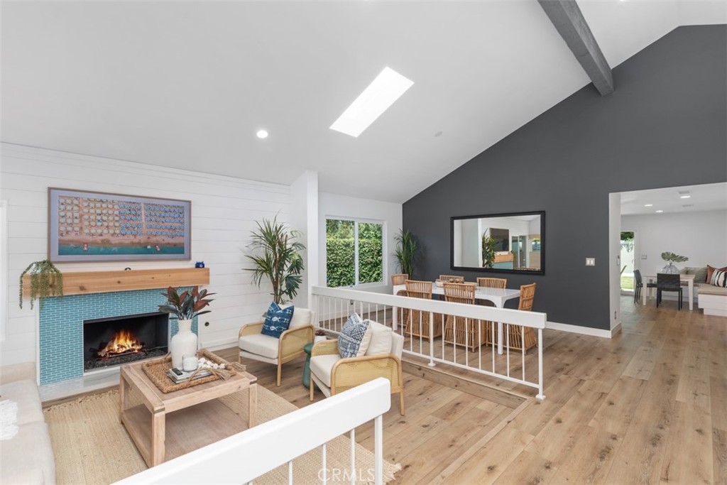 32772 Shipside Drive Dana Point, CA 92629 - Photo 3 of 56 a living room with furniture a fireplace and a flat screen tv
