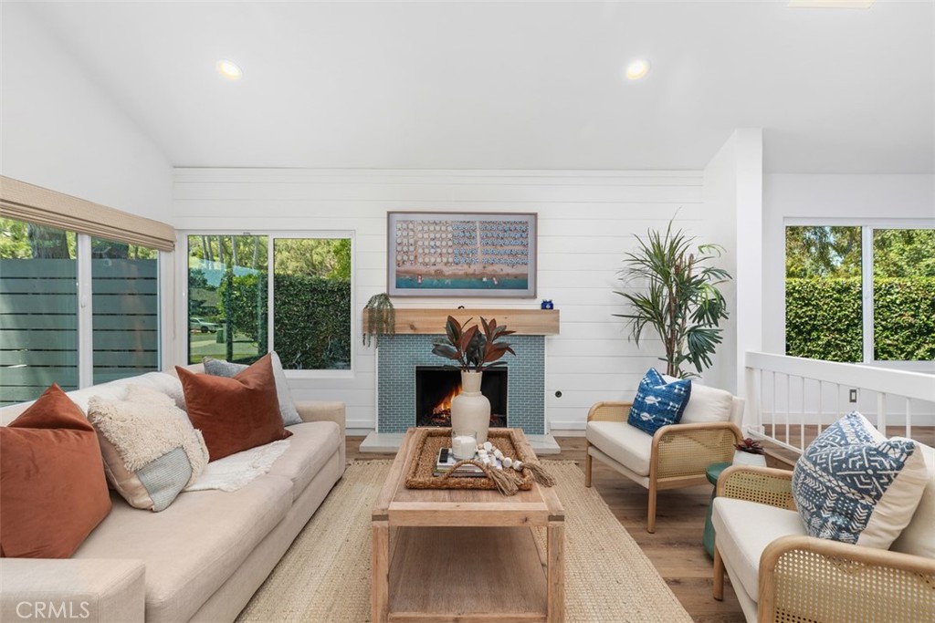 32772 Shipside Drive Dana Point, CA 92629 - Photo 5 of 56 a living room with furniture fireplace and large windows