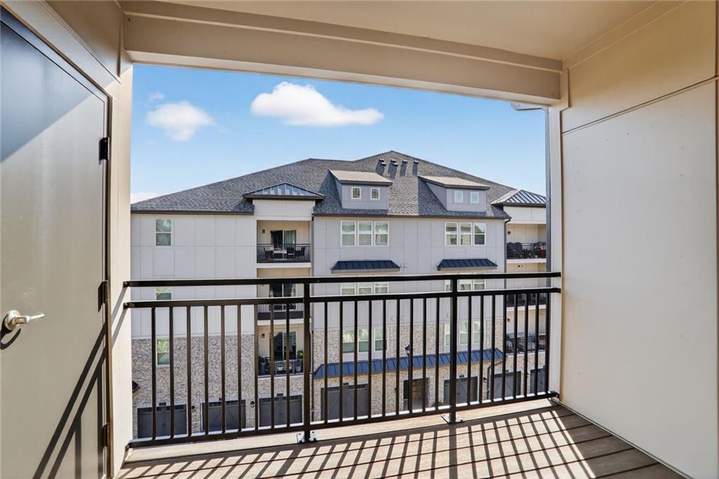 3321 Orwell Way, Unit 3402 Cumming, GA 30041 - Photo 12 of 30 a view of a roof deck