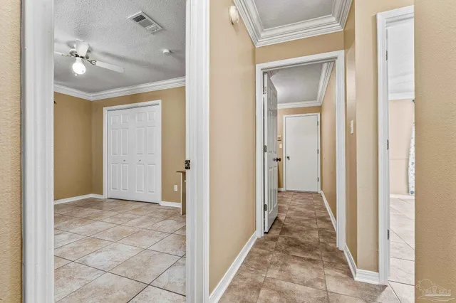 a view of a bathroom with a sink and a mirror