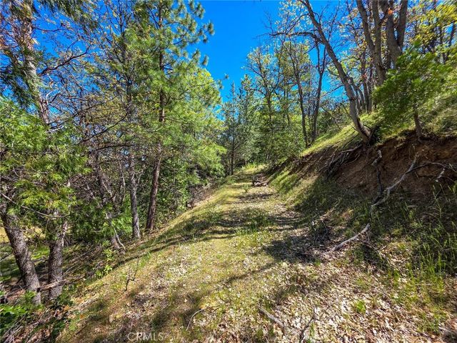 a view of a lake with a yard