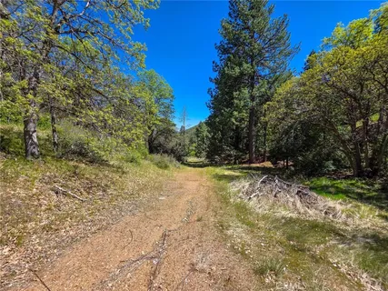 a view of swimming pool with an outdoor seating