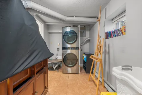 a bathroom with a toilet a sink and a bathtub