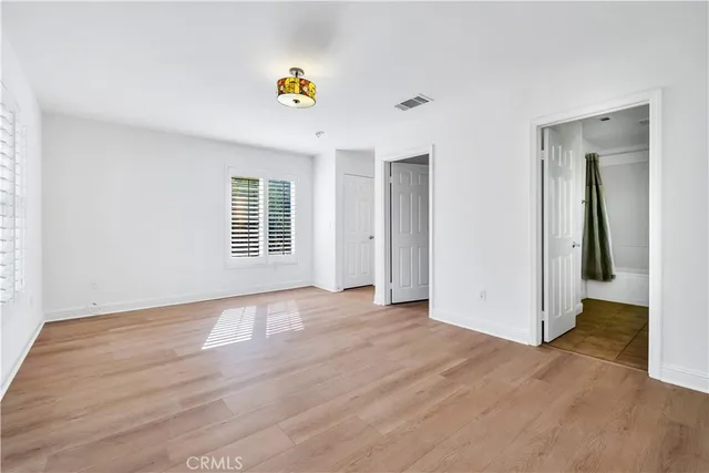 a bathroom with a sink a mirror and a bathtub