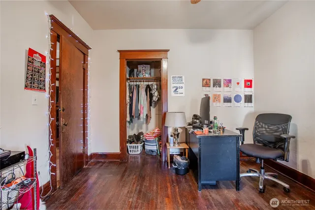 a view of storage and utility room with a window