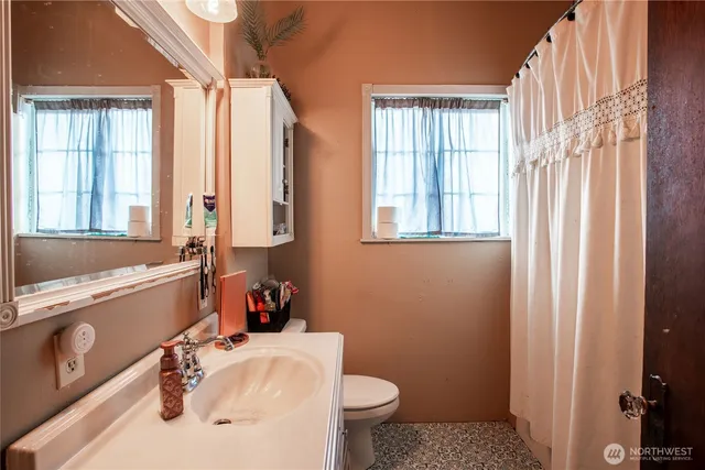 a bedroom with a bed and furniture