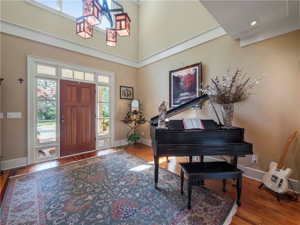 594 Peachtree Road Hoschton, GA 30548 - Photo 19 of 96 a living room with furniture and a window