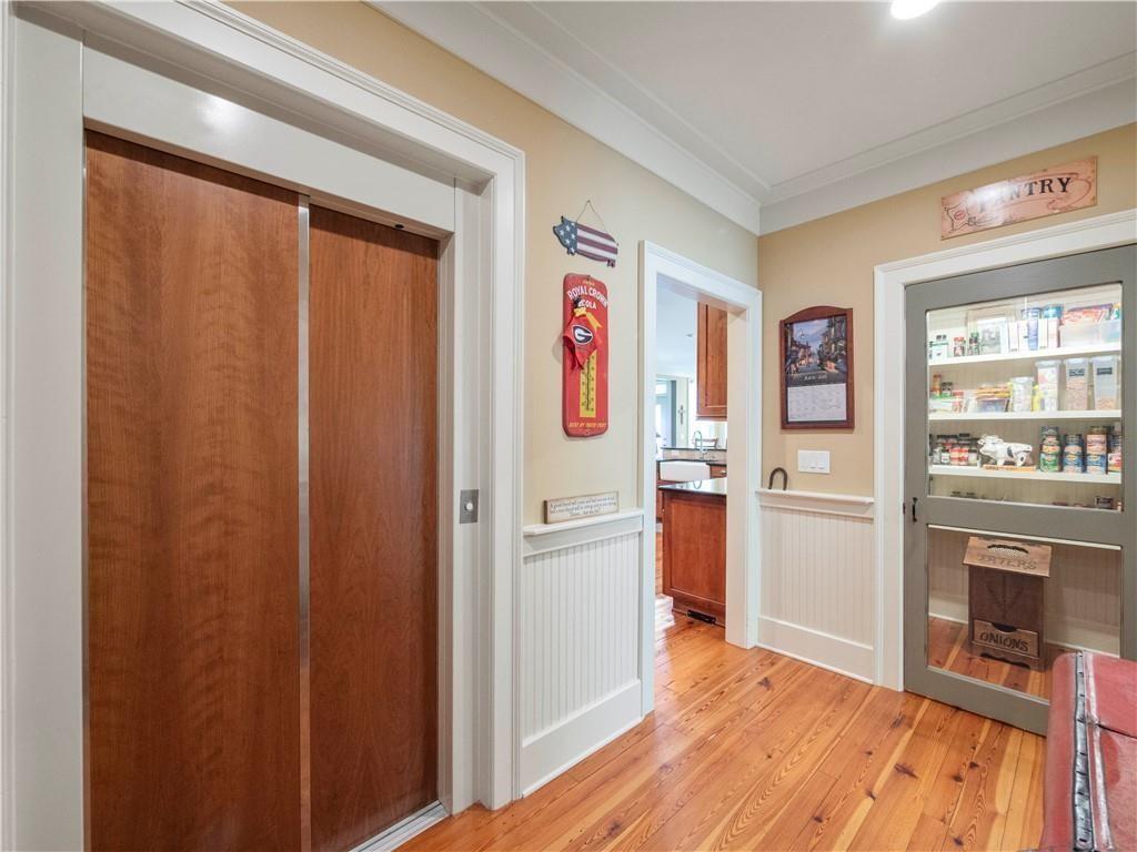 594 Peachtree Road Hoschton, GA 30548 - Photo 43 of 96 a kitchen with stainless steel appliances granite countertop a refrigerator and a stove top oven