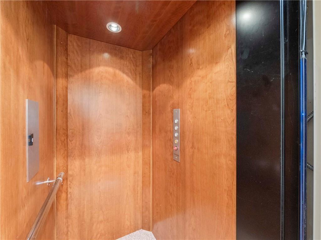 594 Peachtree Road Hoschton, GA 30548 - Photo 45 of 96 a bathroom with a shower and a glass door