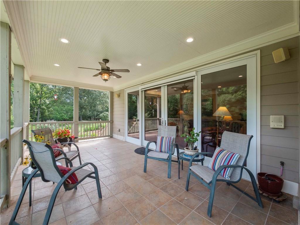 594 Peachtree Road Hoschton, GA 30548 - Photo 67 of 96 a living room with furniture and a large window