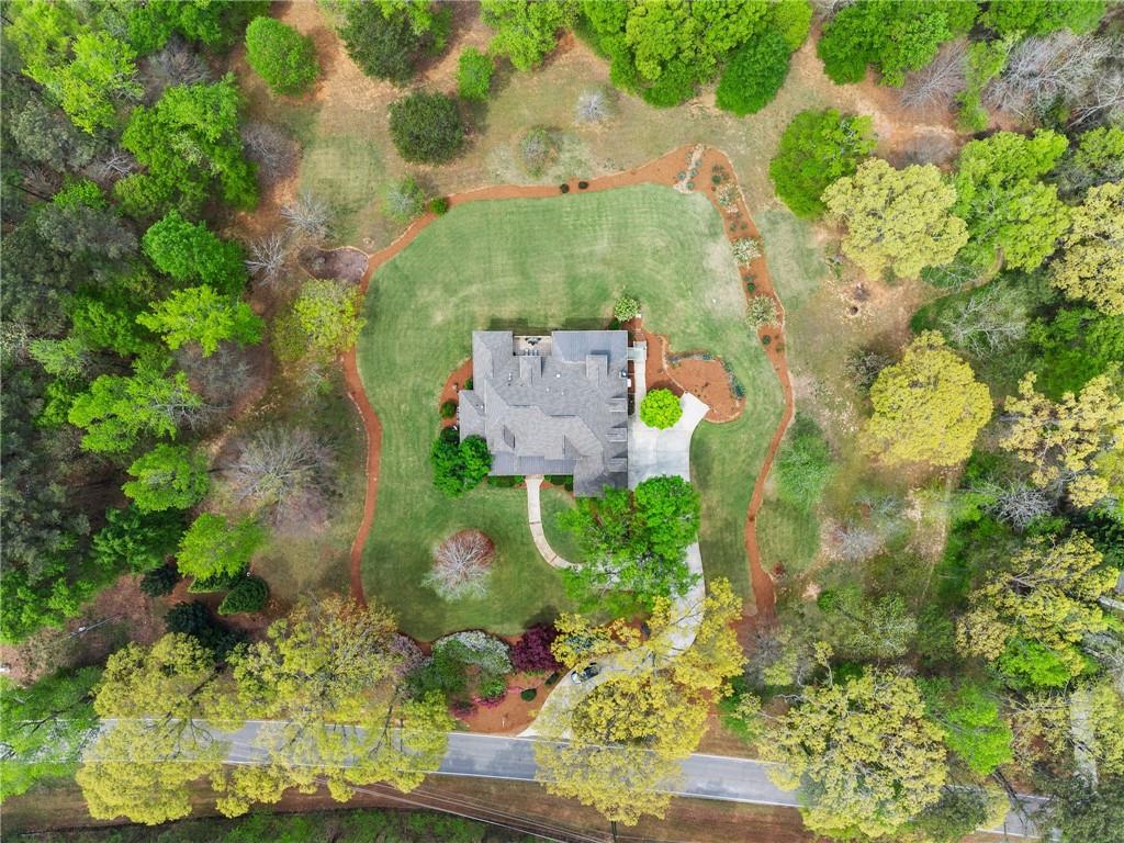 594 Peachtree Road Hoschton, GA 30548 - Photo 93 of 96 an aerial view of a house with a yard