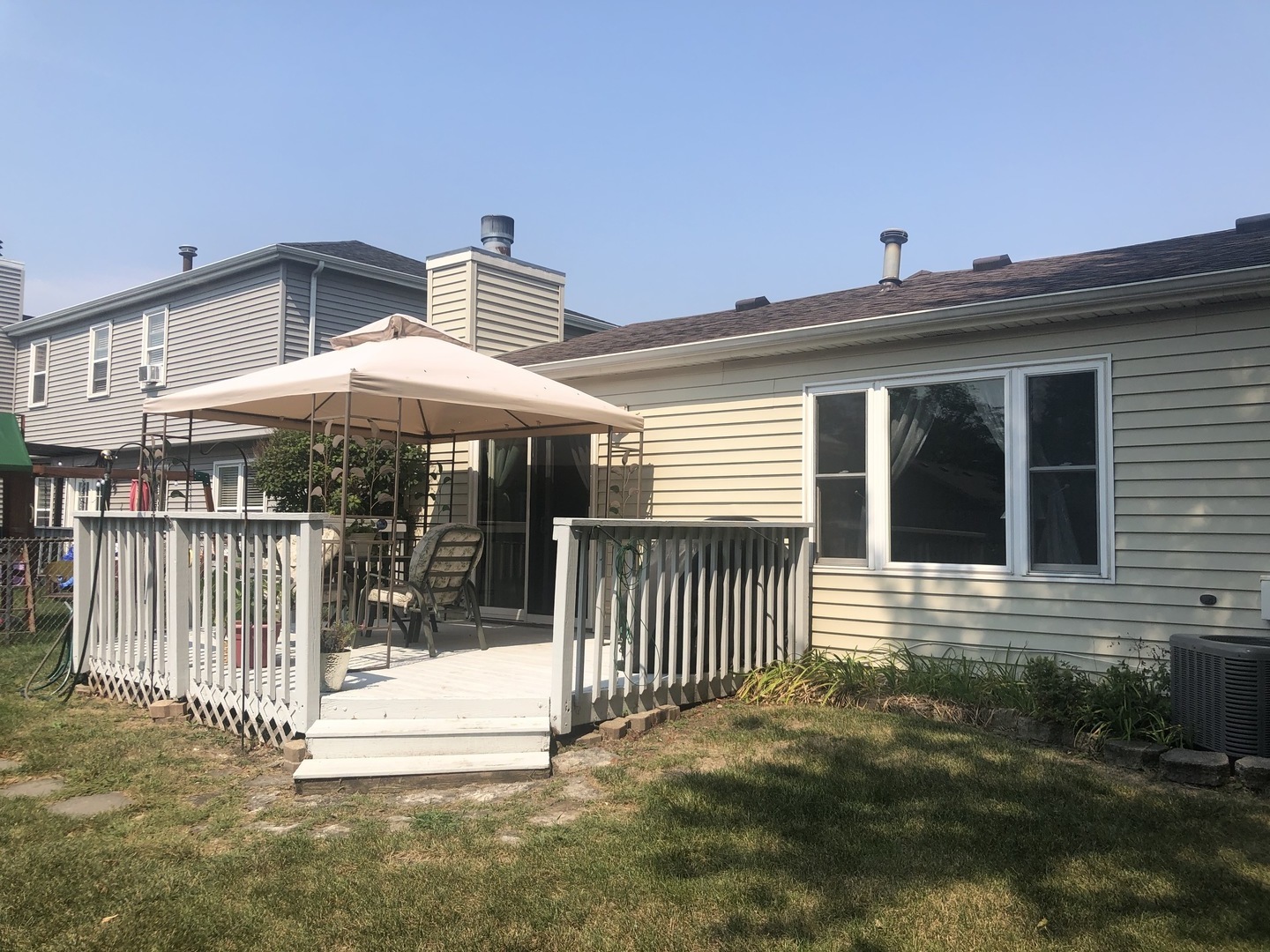 2235 Ridge Avenue Aurora, IL 60504 - Photo 14 of 17 a front view of a house with a porch
