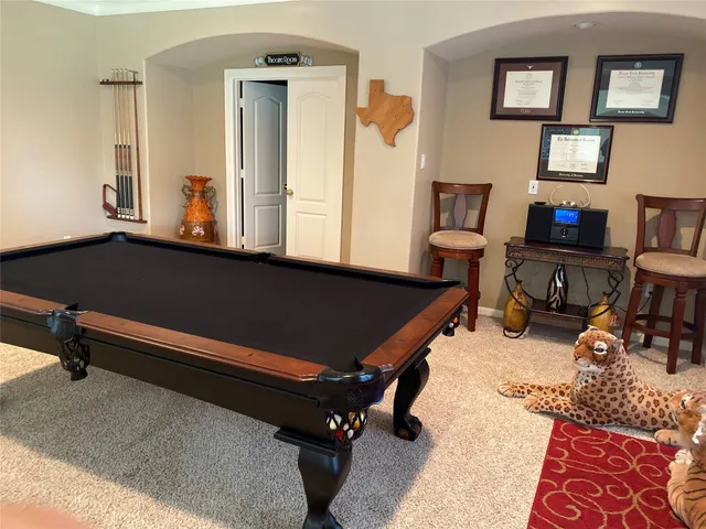 a living room with a couch and a window