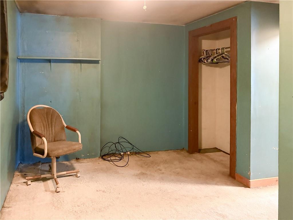 497 Three Mile Hill Mount Pleasant, PA 15666 - Photo 11 of 24 a view of a door and chair in a room