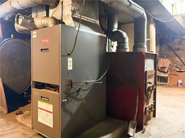 a picture of a bathroom with a mirror