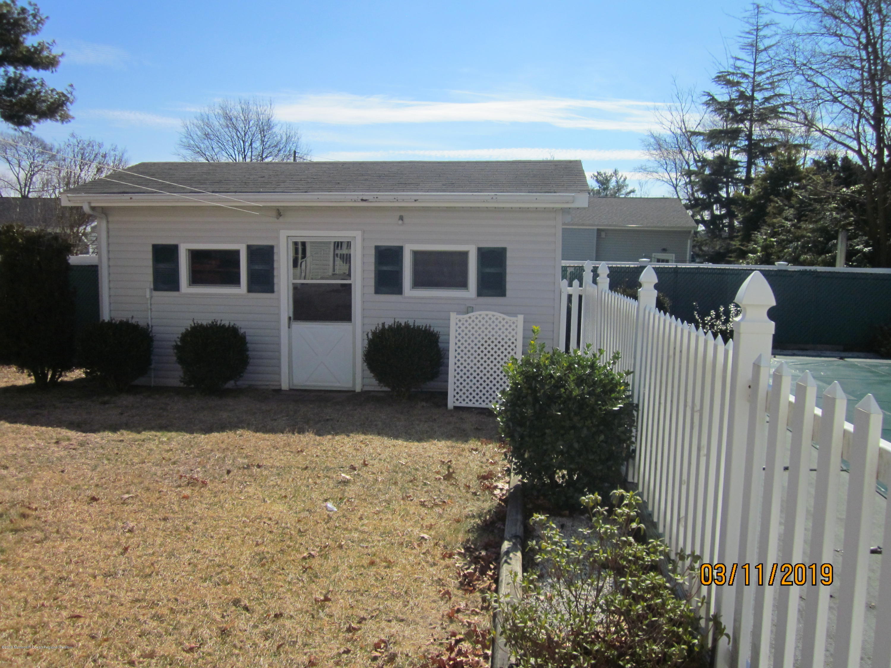 82 Pineland Road Brick, NJ 08724 - Photo 31 of 34 a house view with a garden space