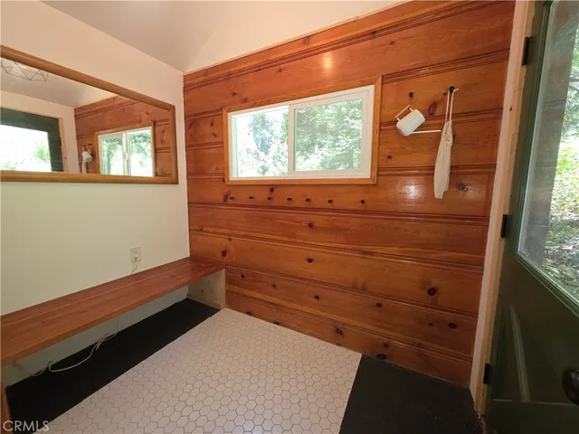 a room with a bed and a window