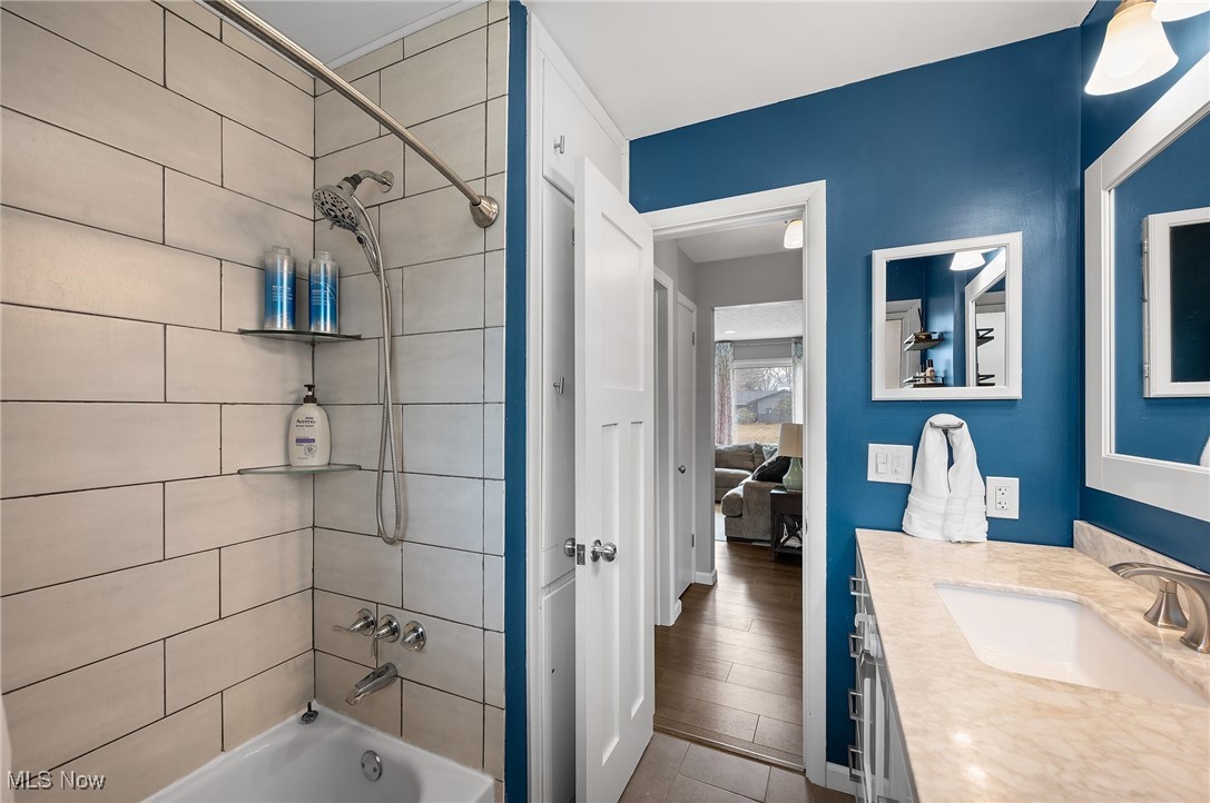 87 Kenridge Road Akron, OH 44333 - Photo 34 of 48 Full bathroom with bathtub / shower combination and vanity