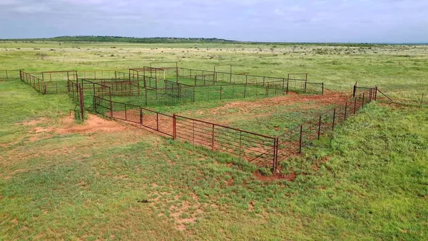 a view of an ocean and a yard