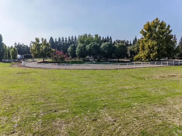 an aerial view of a house with a outdoor space