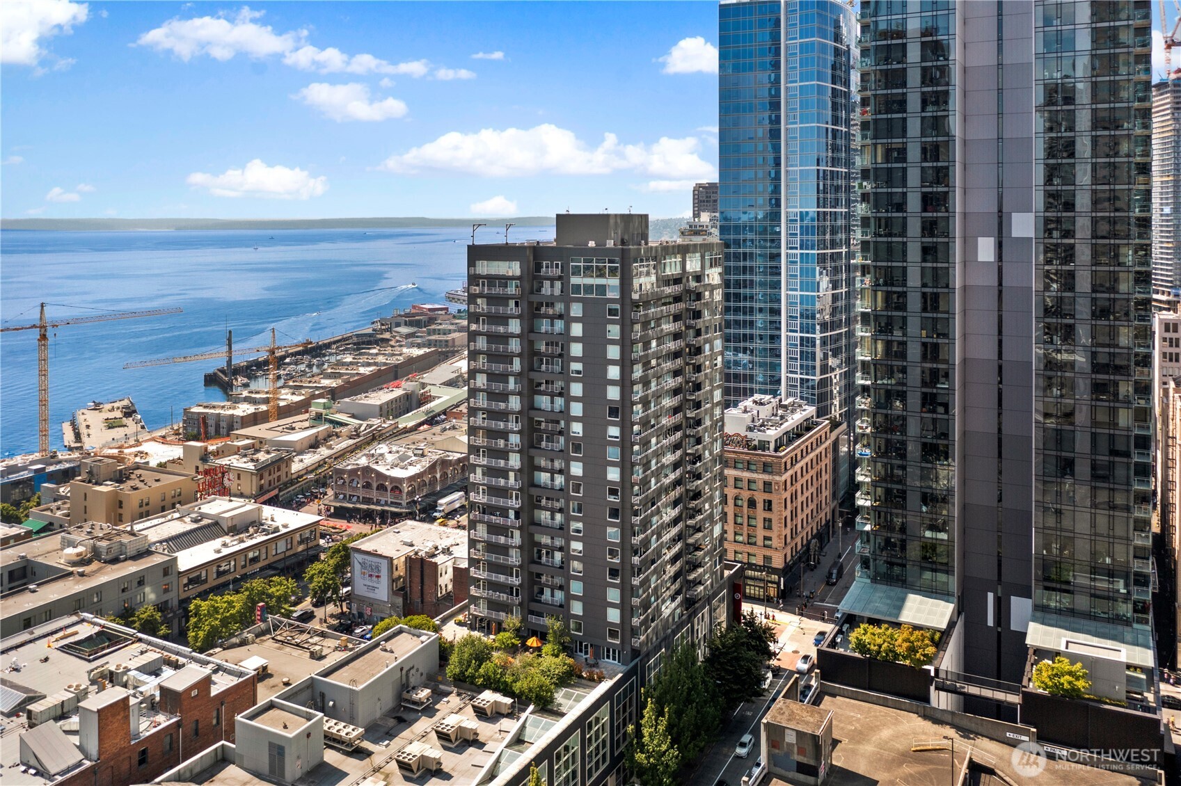 1415 2nd Avenue, Unit 1106 Seattle, WA 98101 - Photo 2 of 30 a view of a city with tall buildings