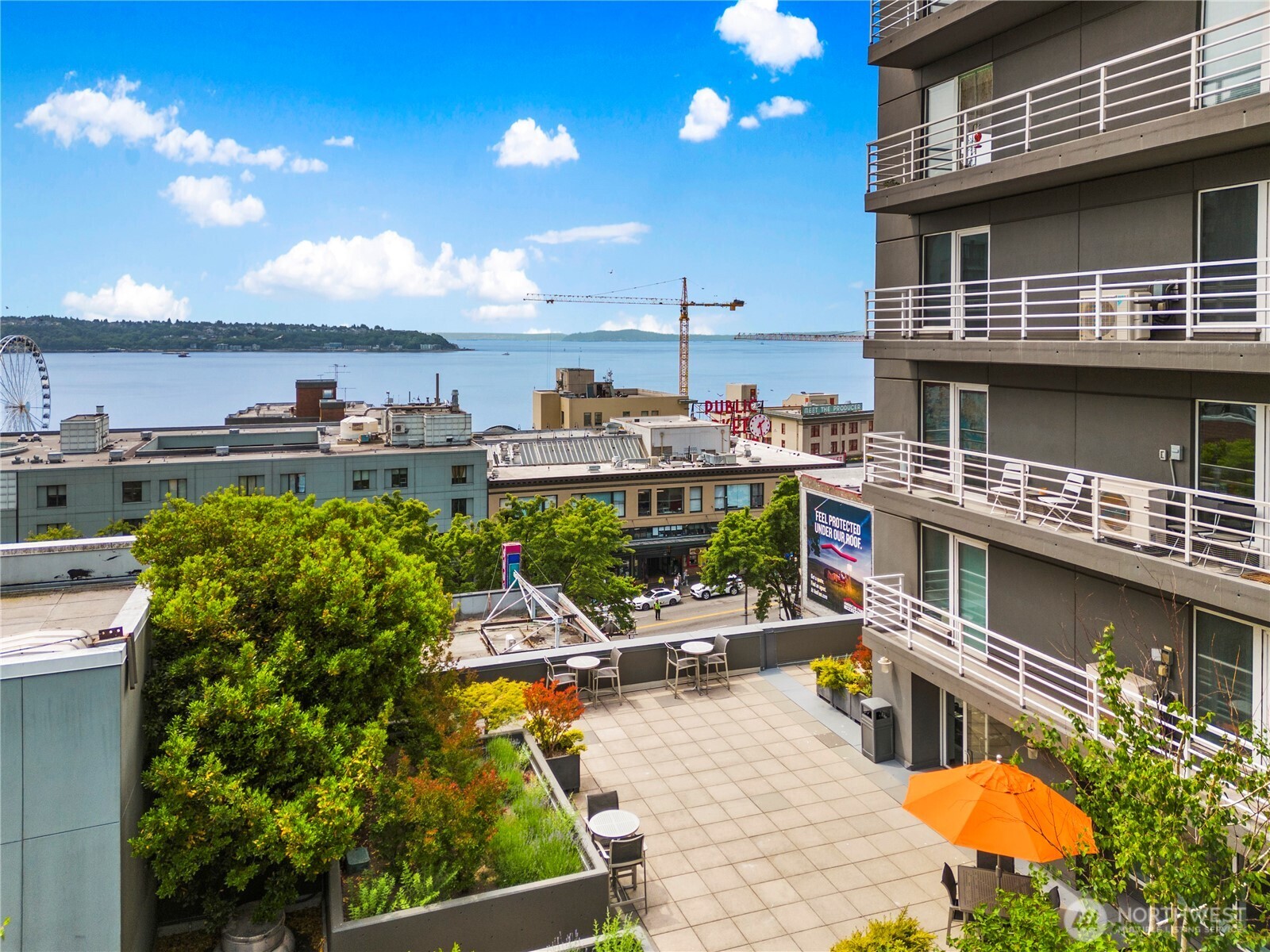 1415 2nd Avenue, Unit 1106 Seattle, WA 98101 - Photo 29 of 30 a view of a chairs and table in a patio