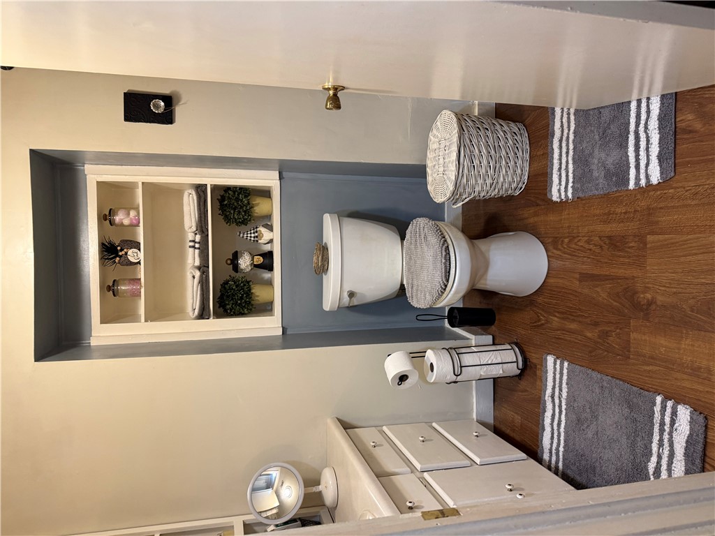 615 Taylor Street Central, SC 29630 - Photo 11 of 16 This bathroom features a storage nook for essentials.