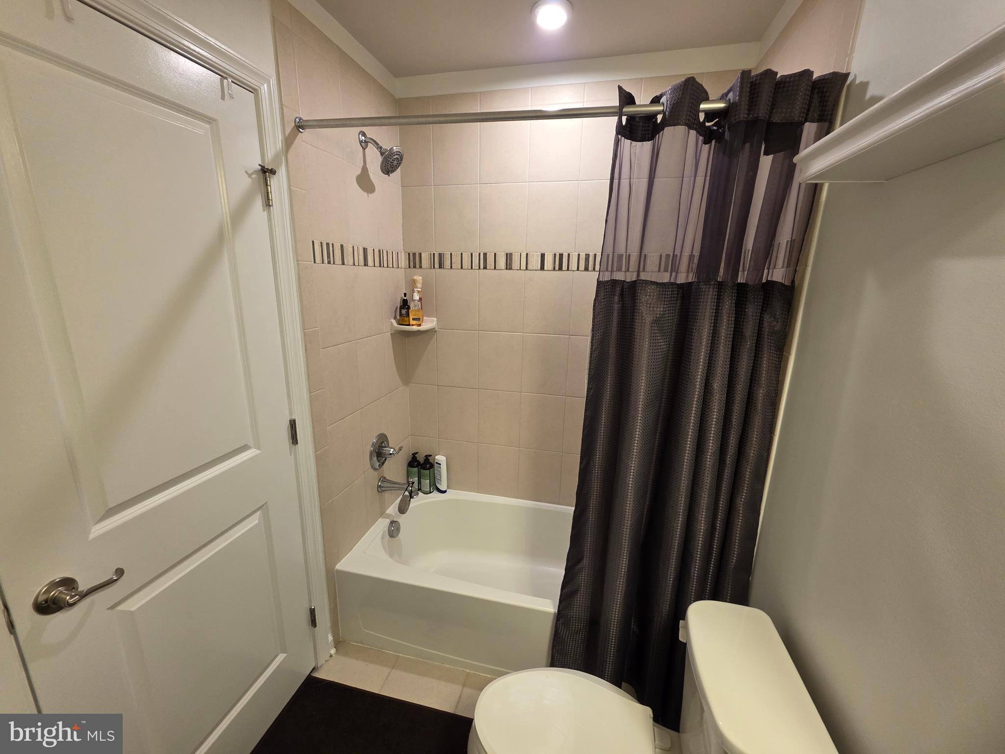 43815 Stubble Cor Square Ashburn, VA 20147 - Photo 19 of 23 a bathroom with a sink toilet and shower