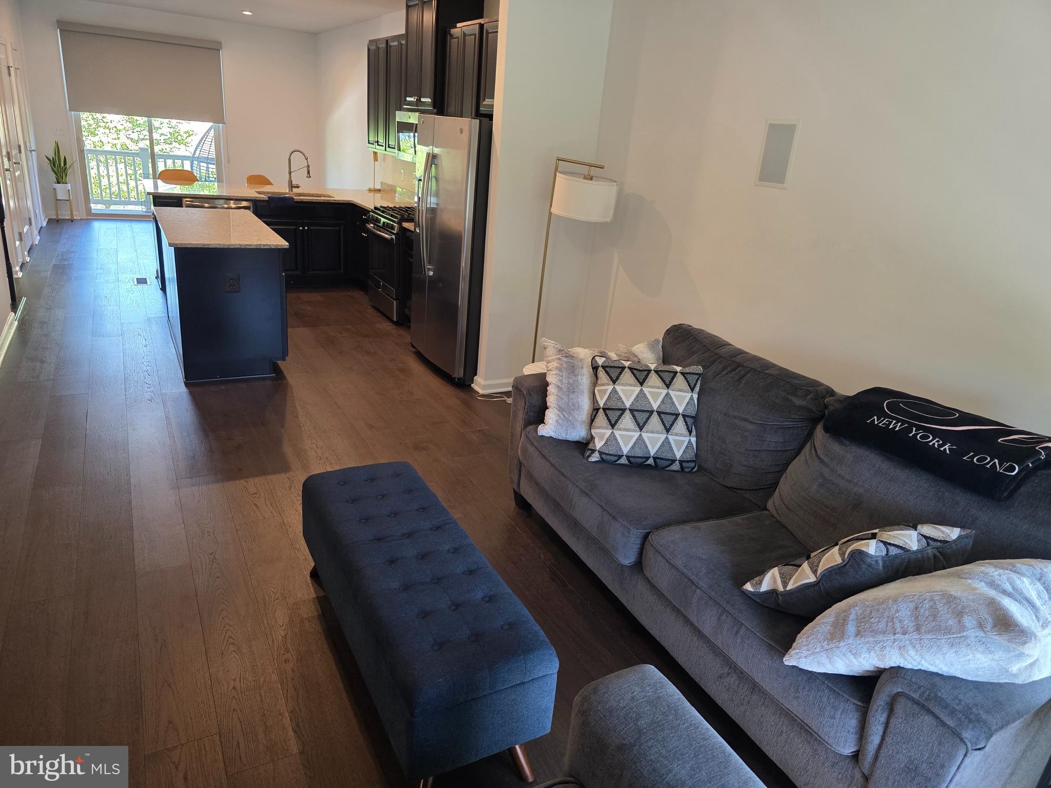 43815 Stubble Cor Square Ashburn, VA 20147 - Photo 7 of 23 a living room with furniture rug and window