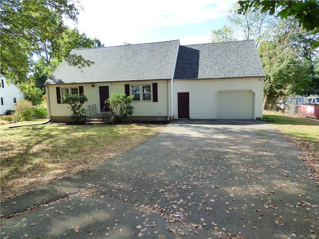 29 North Airline Road Wallingford, CT 06492 - Photo 1 of 1 a front view of a house with a yard and garage