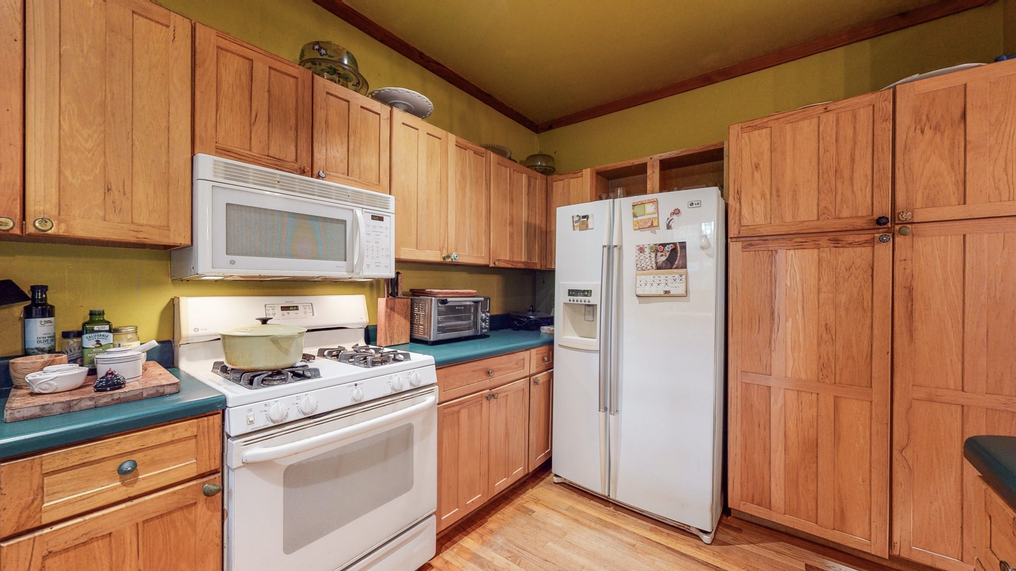 7715 Fernvale Road Fairview, TN 37062 - Photo 15 of 46 a kitchen with stainless steel appliances granite countertop a refrigerator sink and cabinets