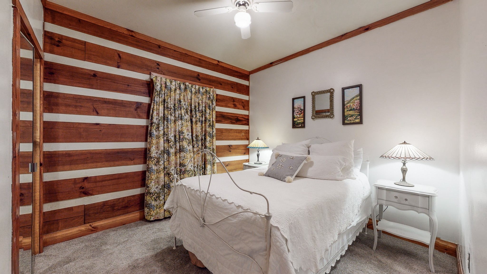 7715 Fernvale Road Fairview, TN 37062 - Photo 17 of 46 a bedroom with a bed and a chandelier