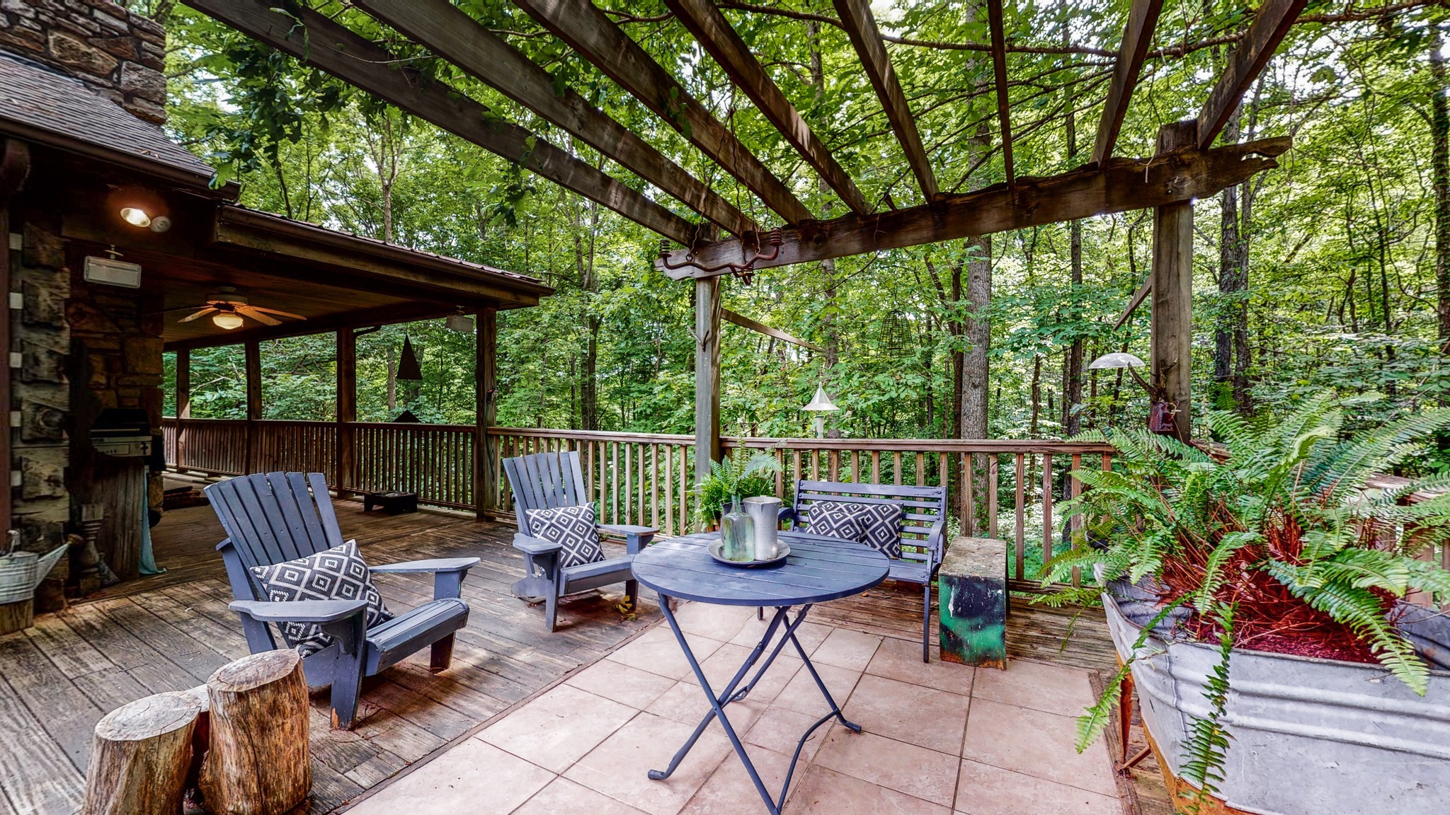 7715 Fernvale Road Fairview, TN 37062 - Photo 3 of 46 a view of a patio with a table chairs and a small yard