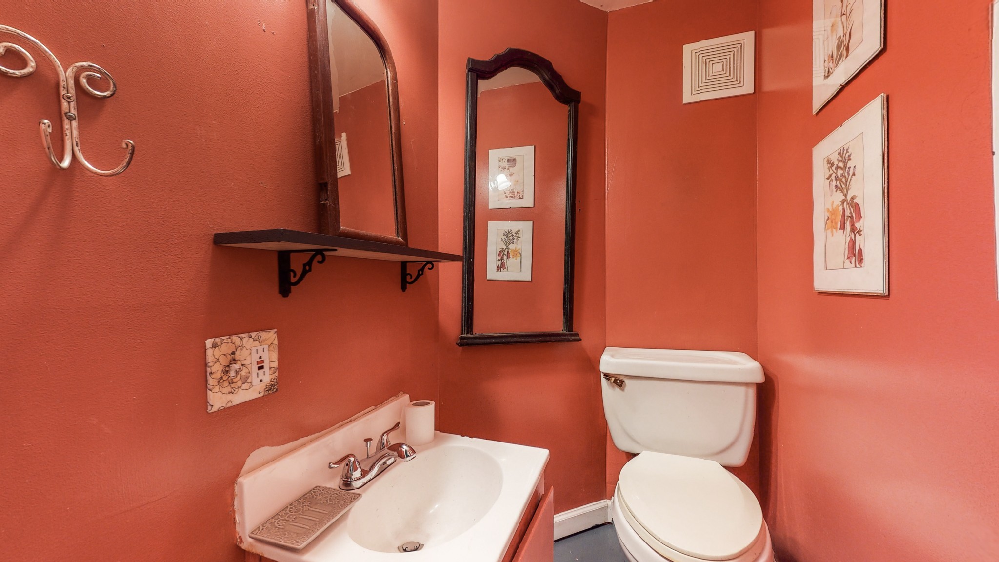 7715 Fernvale Road Fairview, TN 37062 - Photo 26 of 46 a white toilet sitting next to a bathroom sink