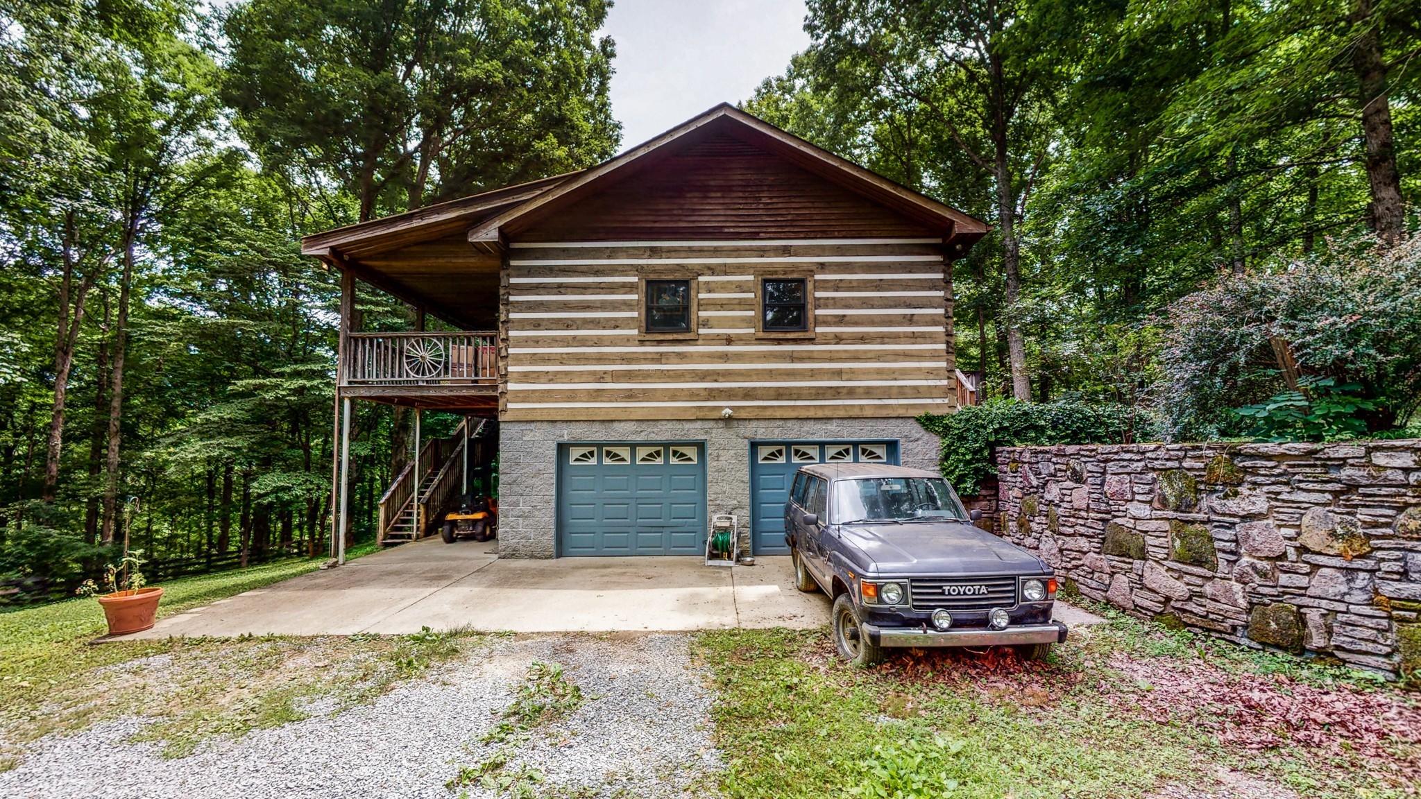 7715 Fernvale Road Fairview, TN 37062 - Photo 29 of 46 a front view of a house with a garden