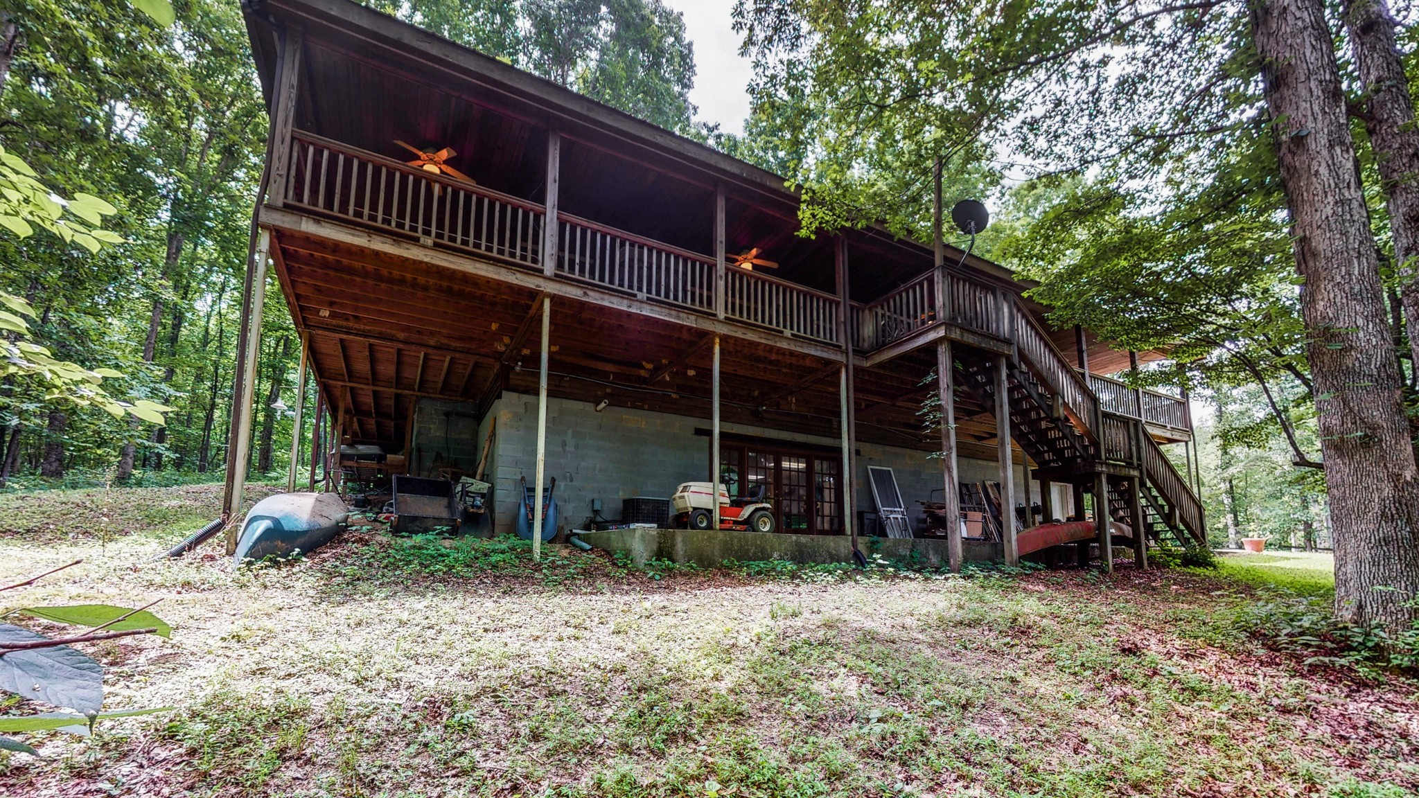 7715 Fernvale Road Fairview, TN 37062 - Photo 38 of 46 a view of wooden deck with a trees