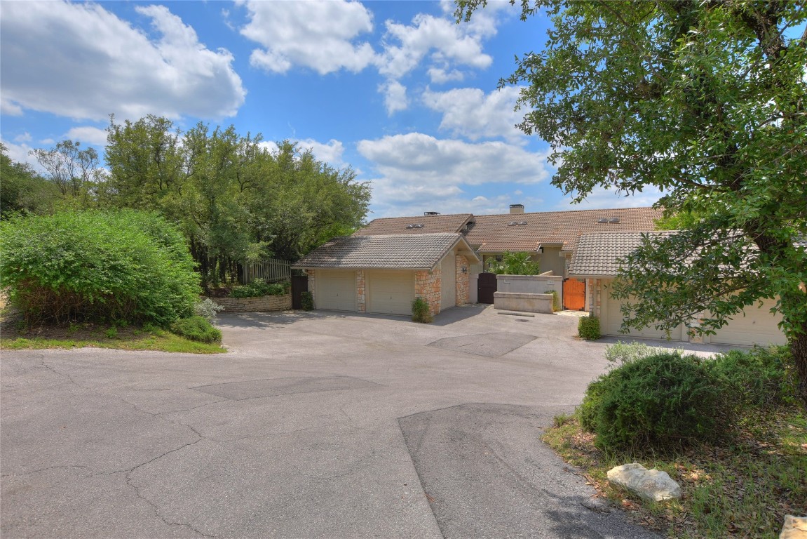 503 Rock Bluff Drive Austin, TX 78734 - Photo 1 of 1 a view of a house with basketball court