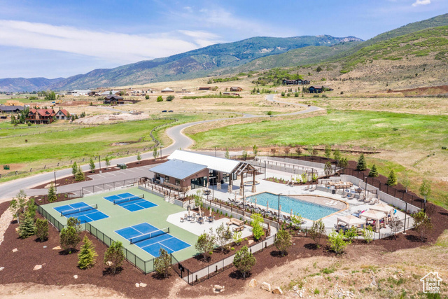 883 Wasatch View Drive, Unit 11 Kamas, UT 84036 - Photo 13 of 14 Drone / aerial view of a mountain backdrop and a pool area