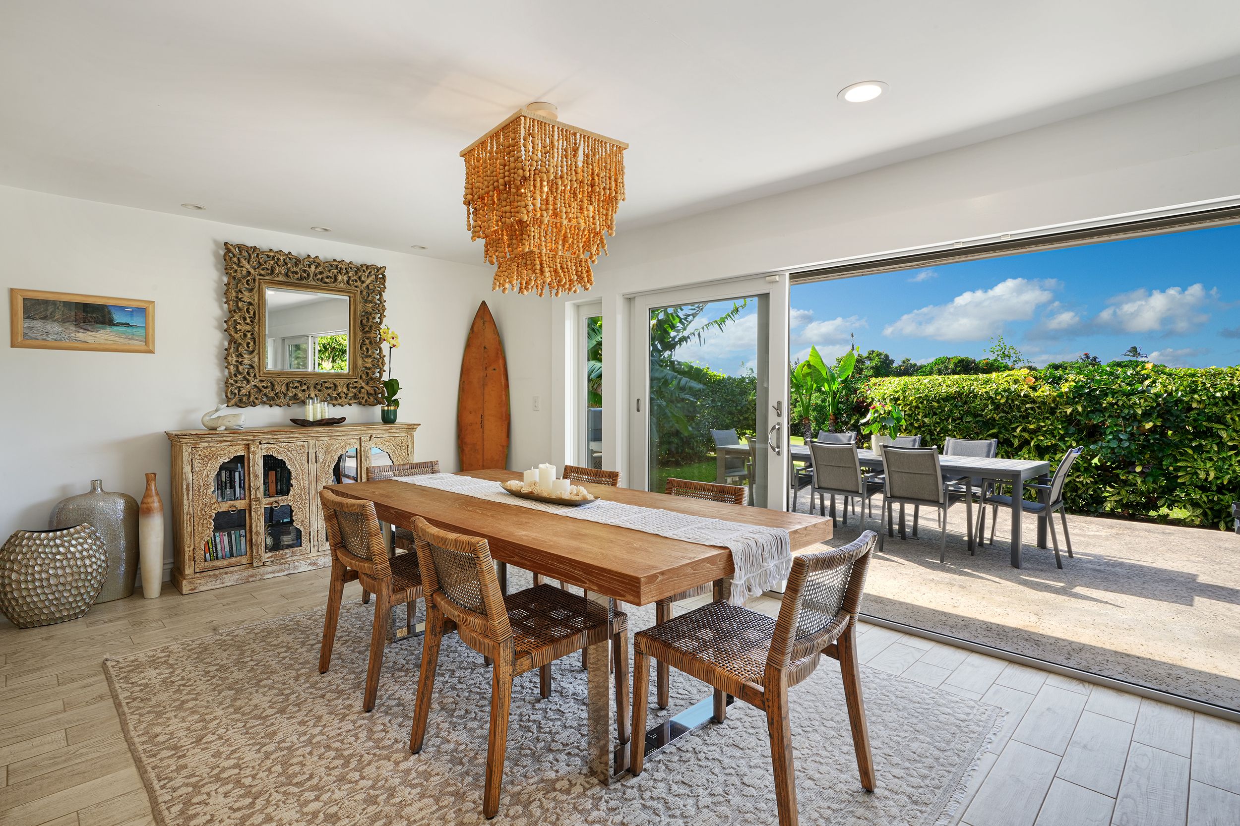 5348 Honoiki Road Princeville, HI 96722 - Photo 7 of 25 a view of a dining room with furniture window and outside view