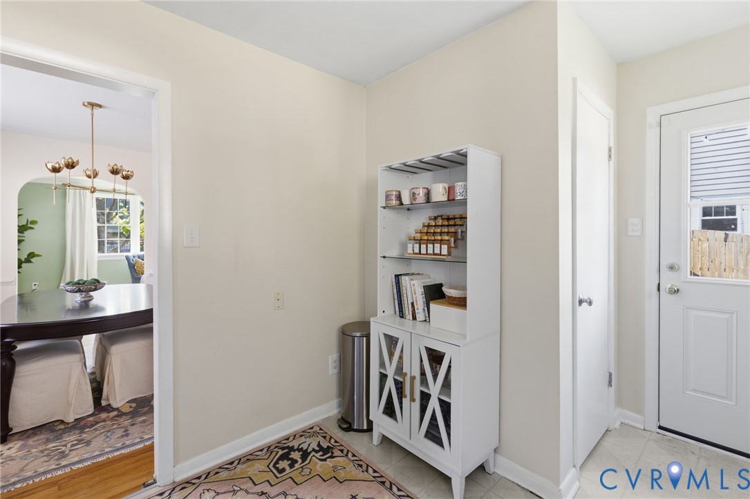 336 Lexington Road Richmond, VA 23226 - Photo 10 of 20 a view of a hallway with workspace and dining room