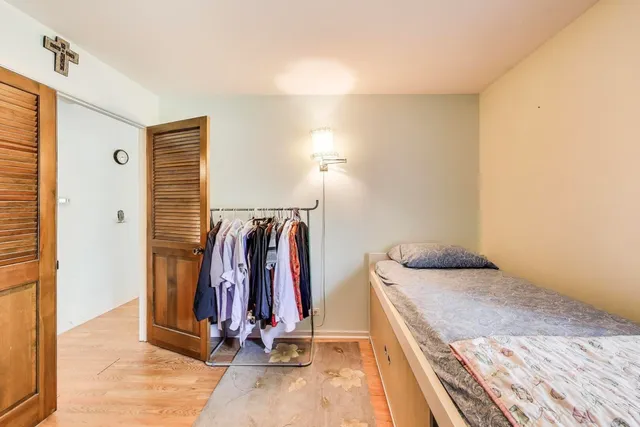 a view of a room with clothes and shoes