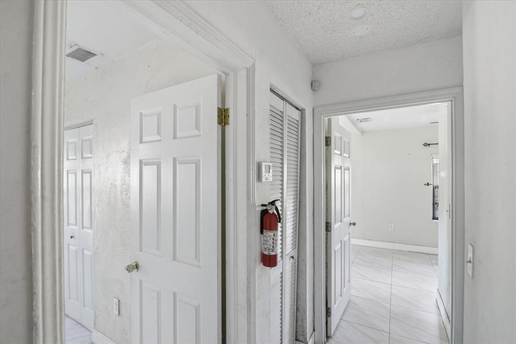 1320 Northwest 86th Street Miami, FL 33147 - Photo 26 of 41 a bathroom with a shower