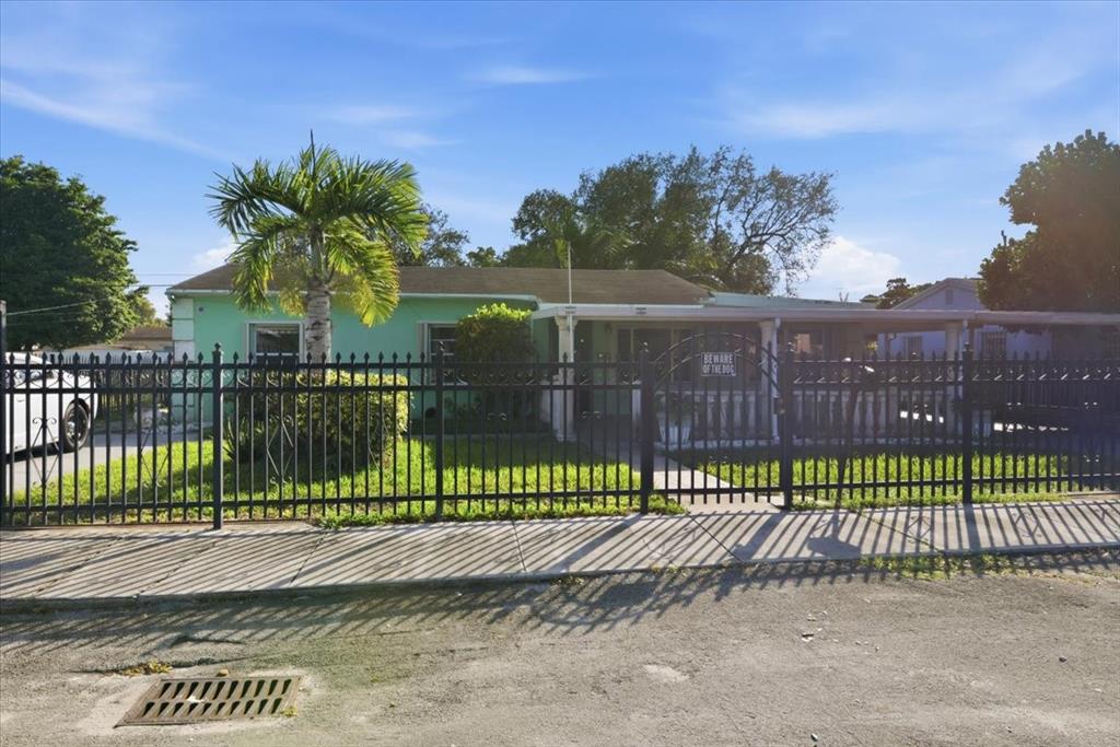 1320 Northwest 86th Street Miami, FL 33147 - Photo 30 of 41 a view of a park with a street view