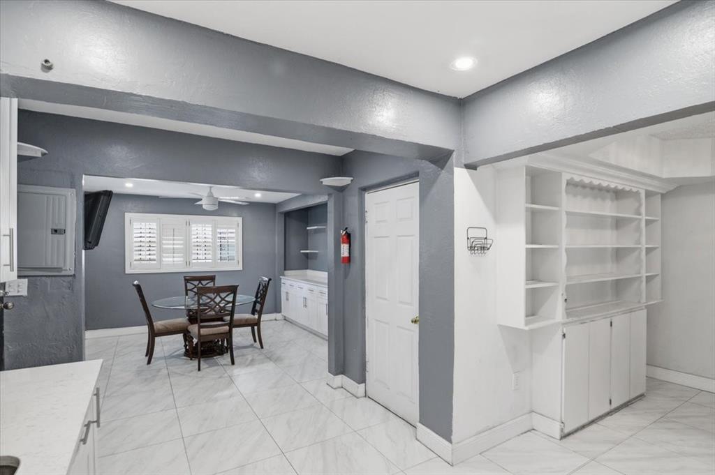 1320 Northwest 86th Street Miami, FL 33147 - Photo 3 of 41 a view of a livingroom with furniture and window
