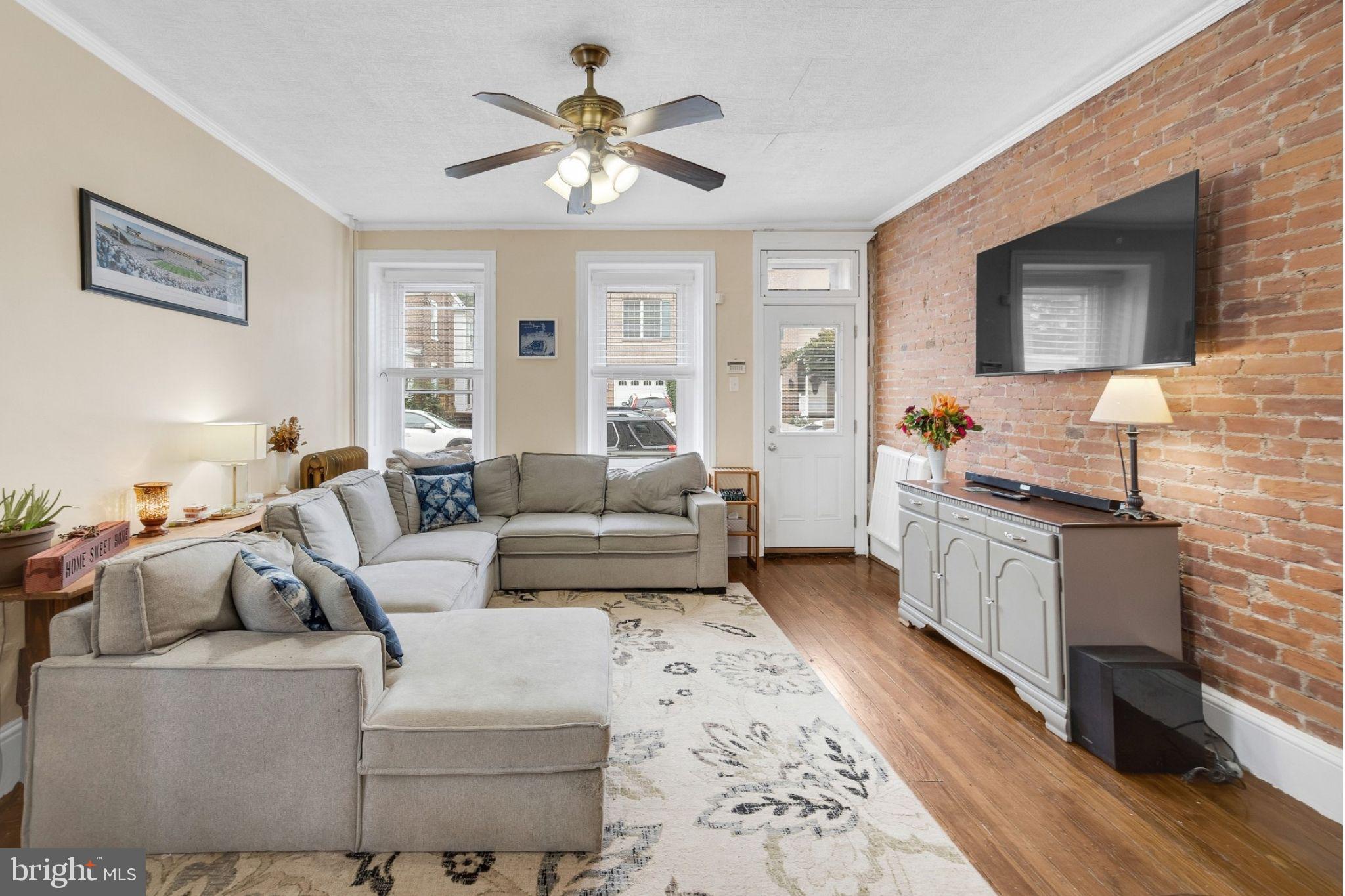 337 Lemonte Street Philadelphia, PA 19128 - Photo 1 of 18 a living room with furniture and a wooden floor