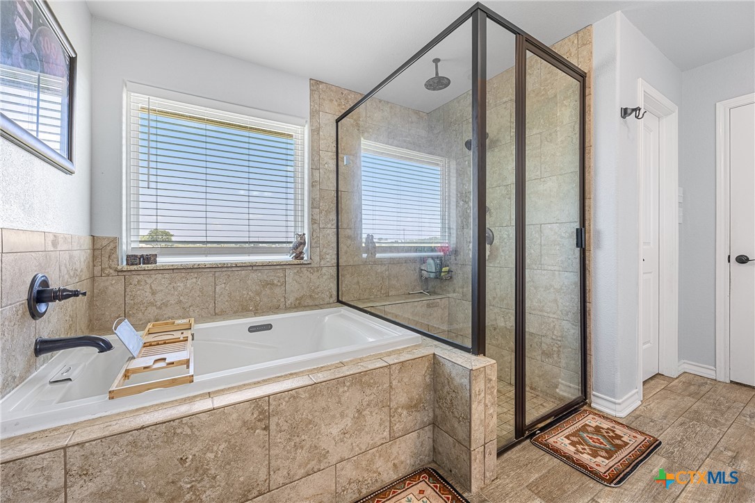 16101 Dove Road Moody, TX 76557 - Photo 22 of 42 a bathroom with a tub and a sink