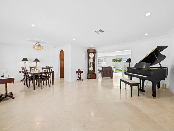 a living room with furniture and a table