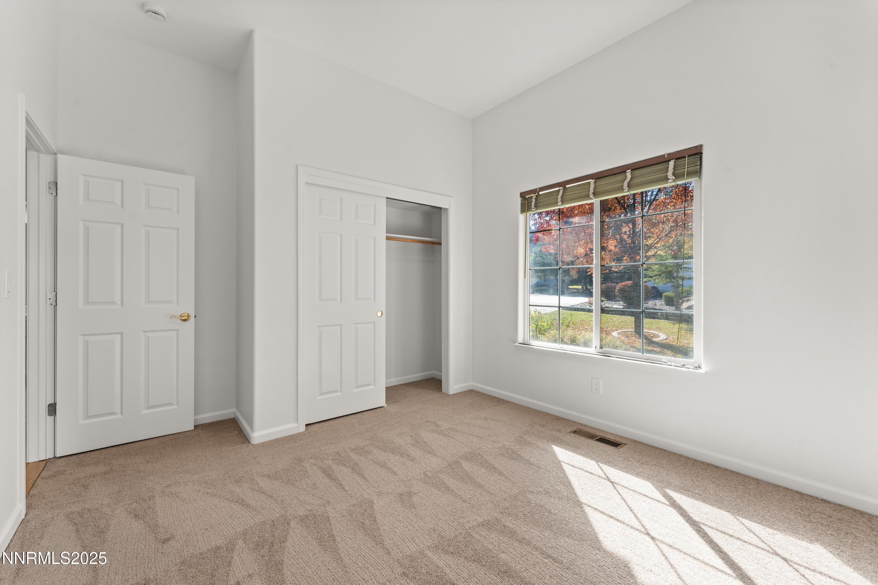 4991 West Albuquerque Road Reno, NV 89511 - Photo 32 of 60 a view of an empty room with a window