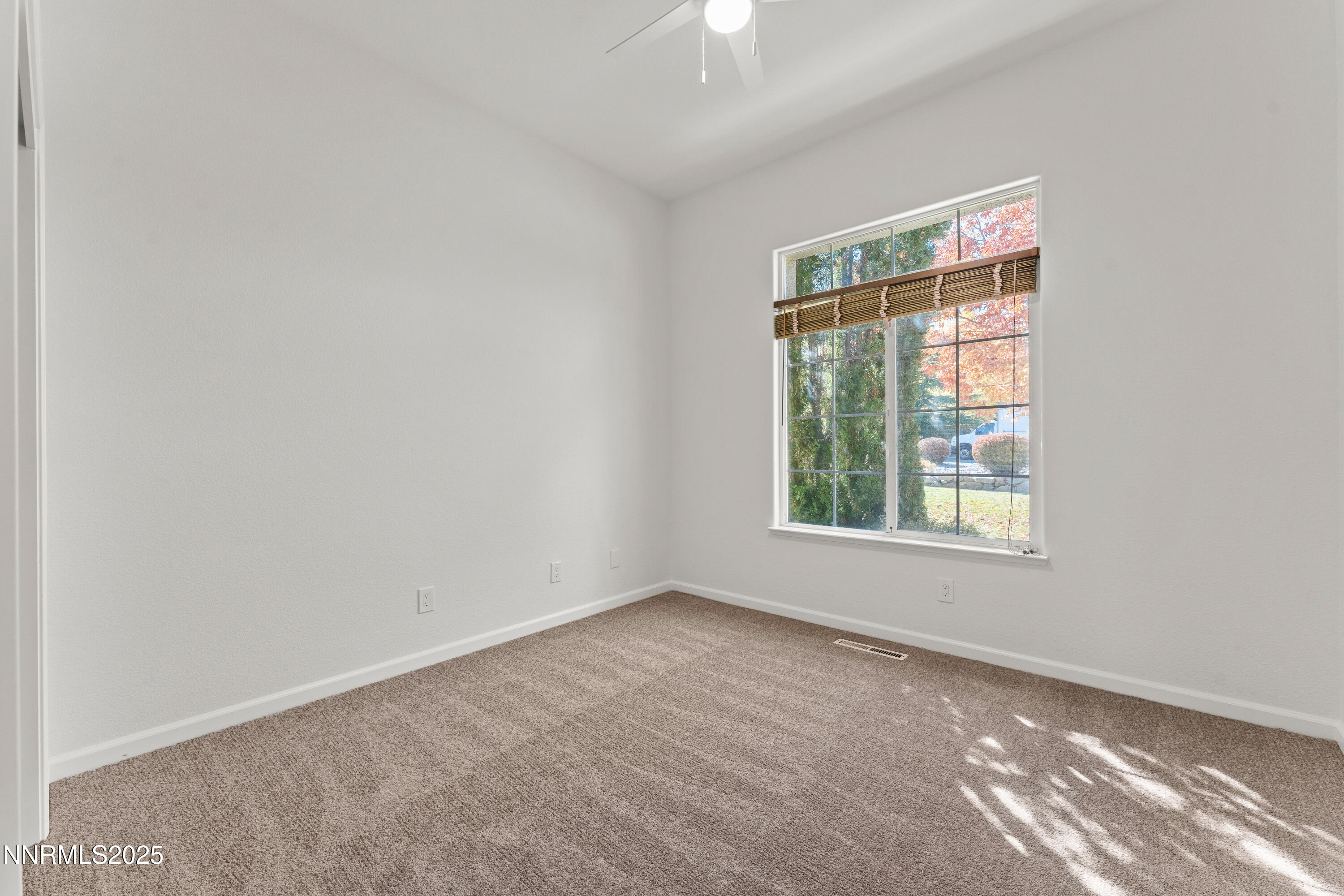 4991 West Albuquerque Road Reno, NV 89511 - Photo 33 of 60 an empty room with a window