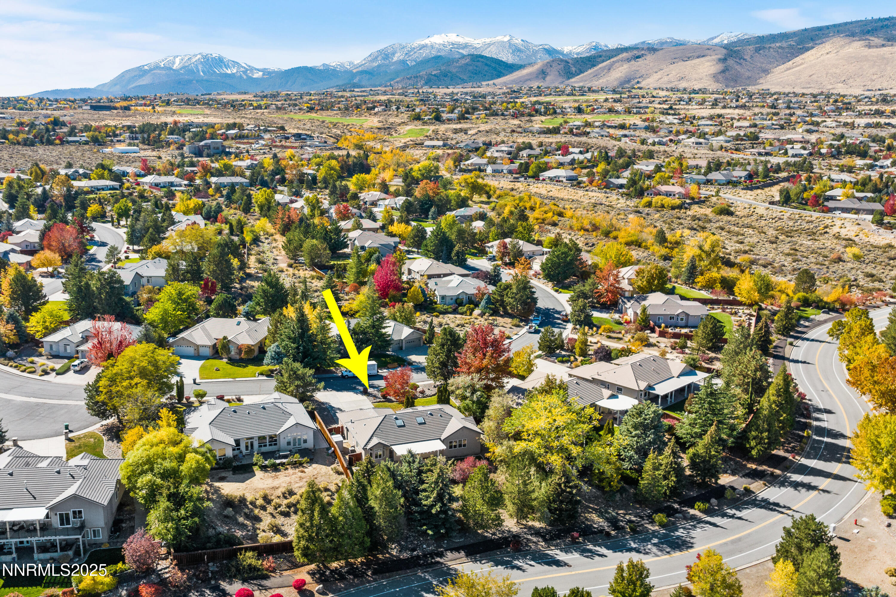 4991 West Albuquerque Road Reno, NV 89511 - Photo 53 of 60 an aerial view of residential houses with outdoor space and trees